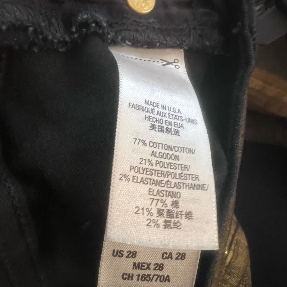 Juicy couture gold metallic jeans 77% cotton 21% polyester—elastic.
